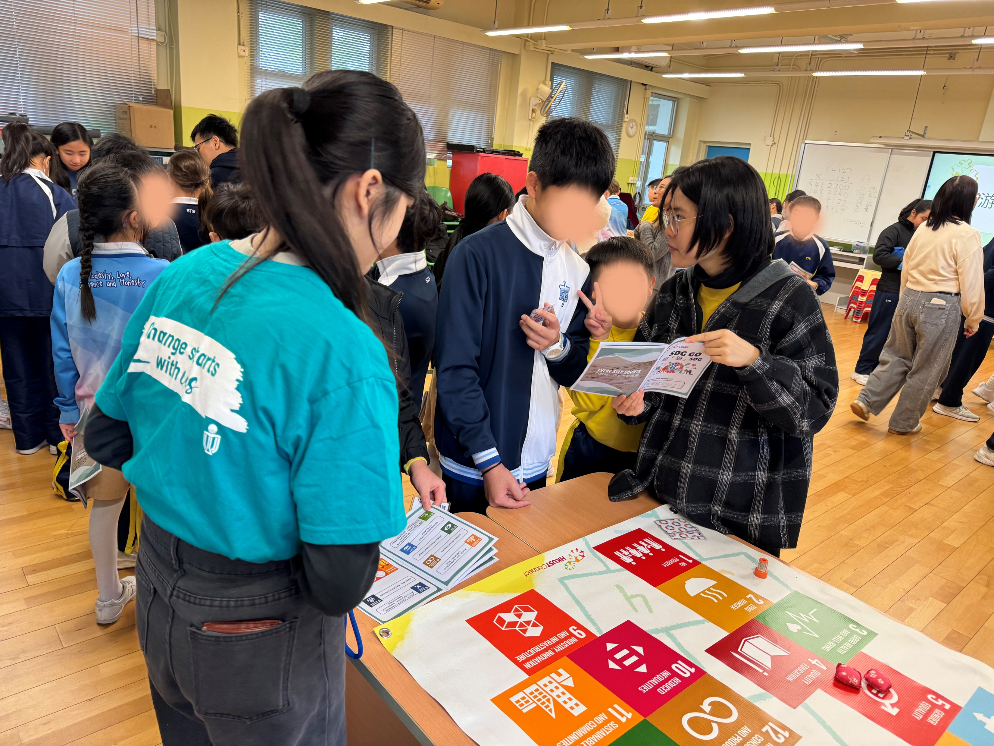 Primary school students enjoying SDG-related games