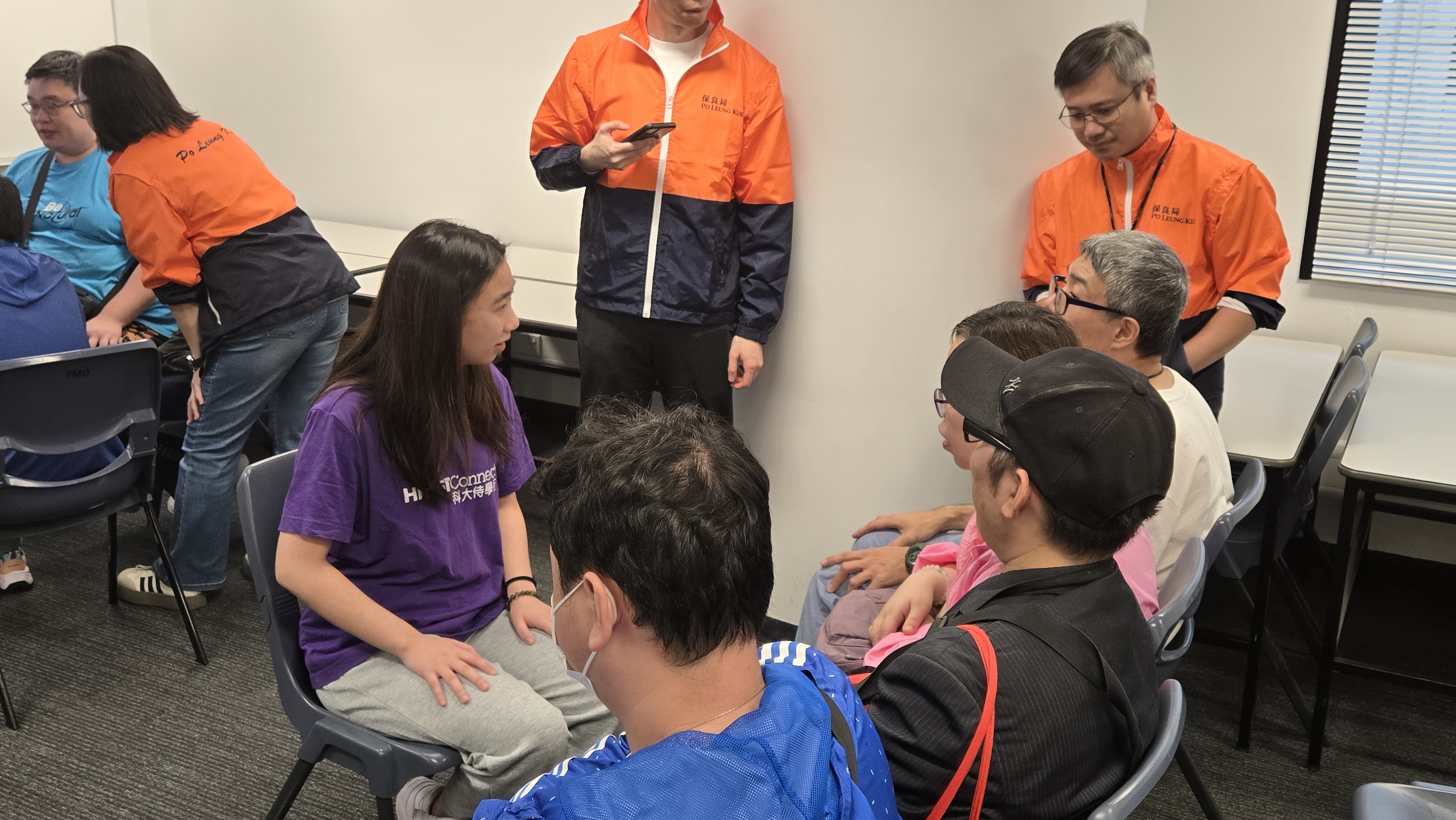 Volunteer and service recipients getting to know each other