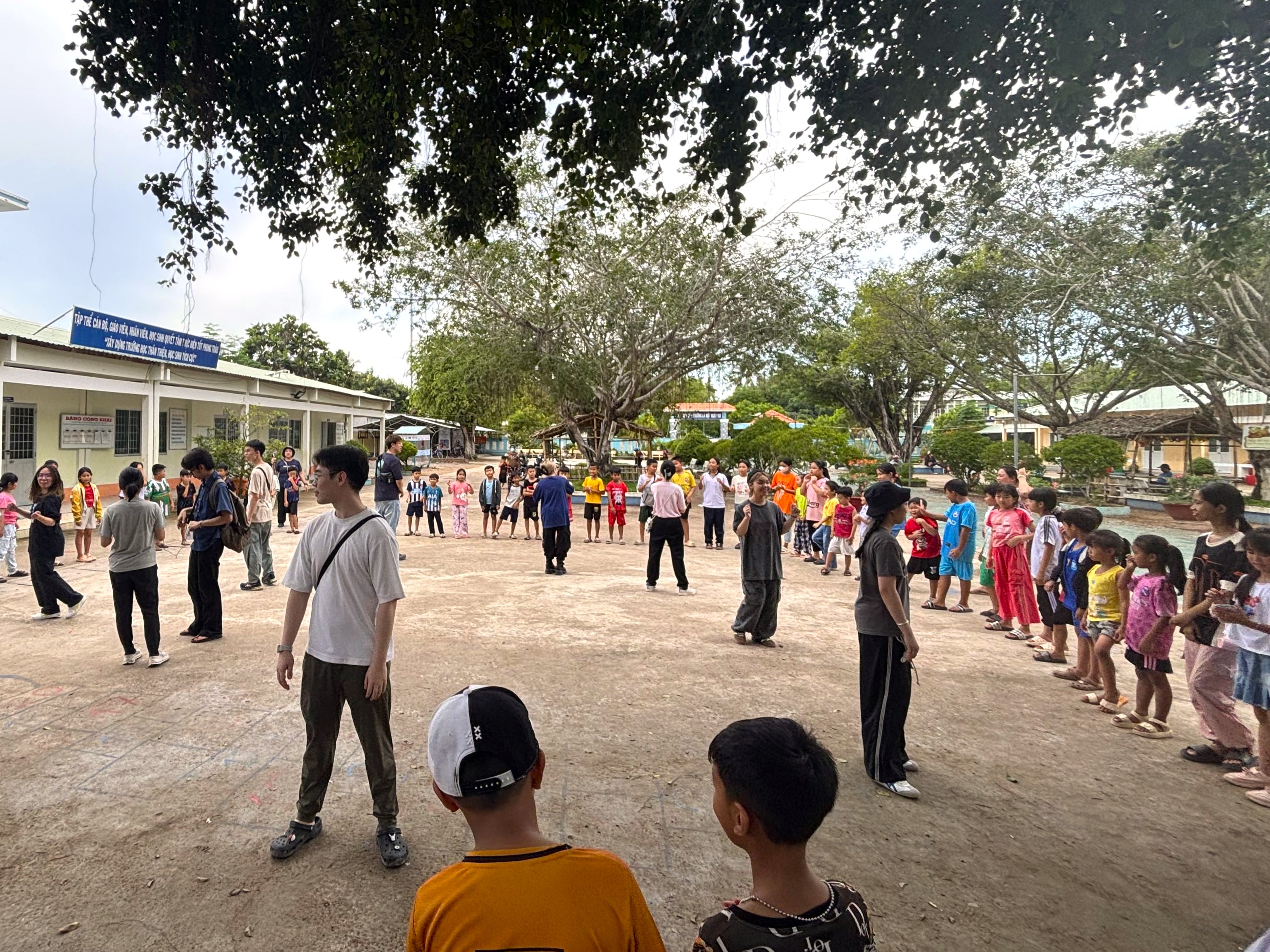 Volunteers having game with local children