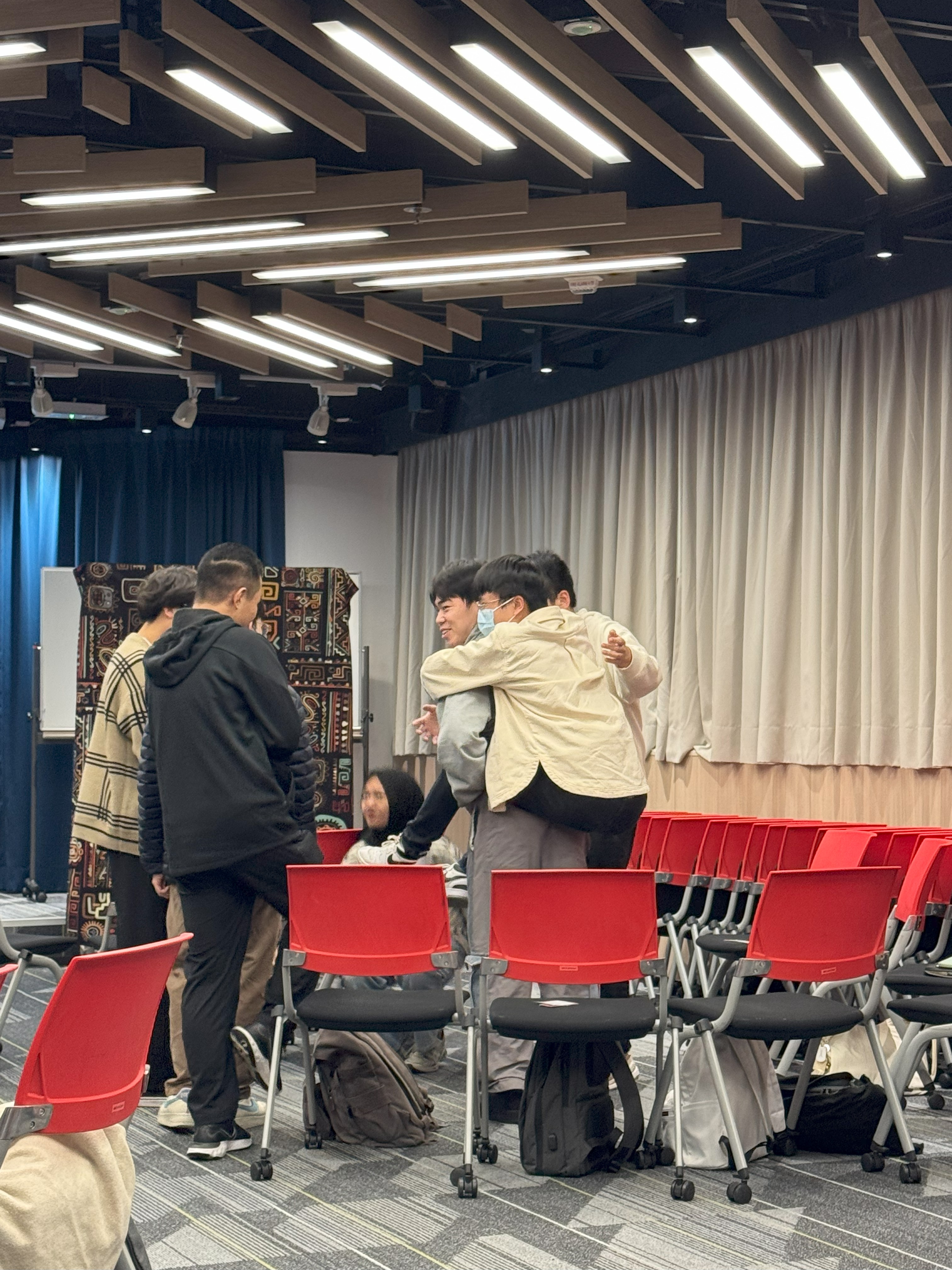 Teams racing against time and each other to secure survival resources, showing that teamwork is key to overcoming obstacles