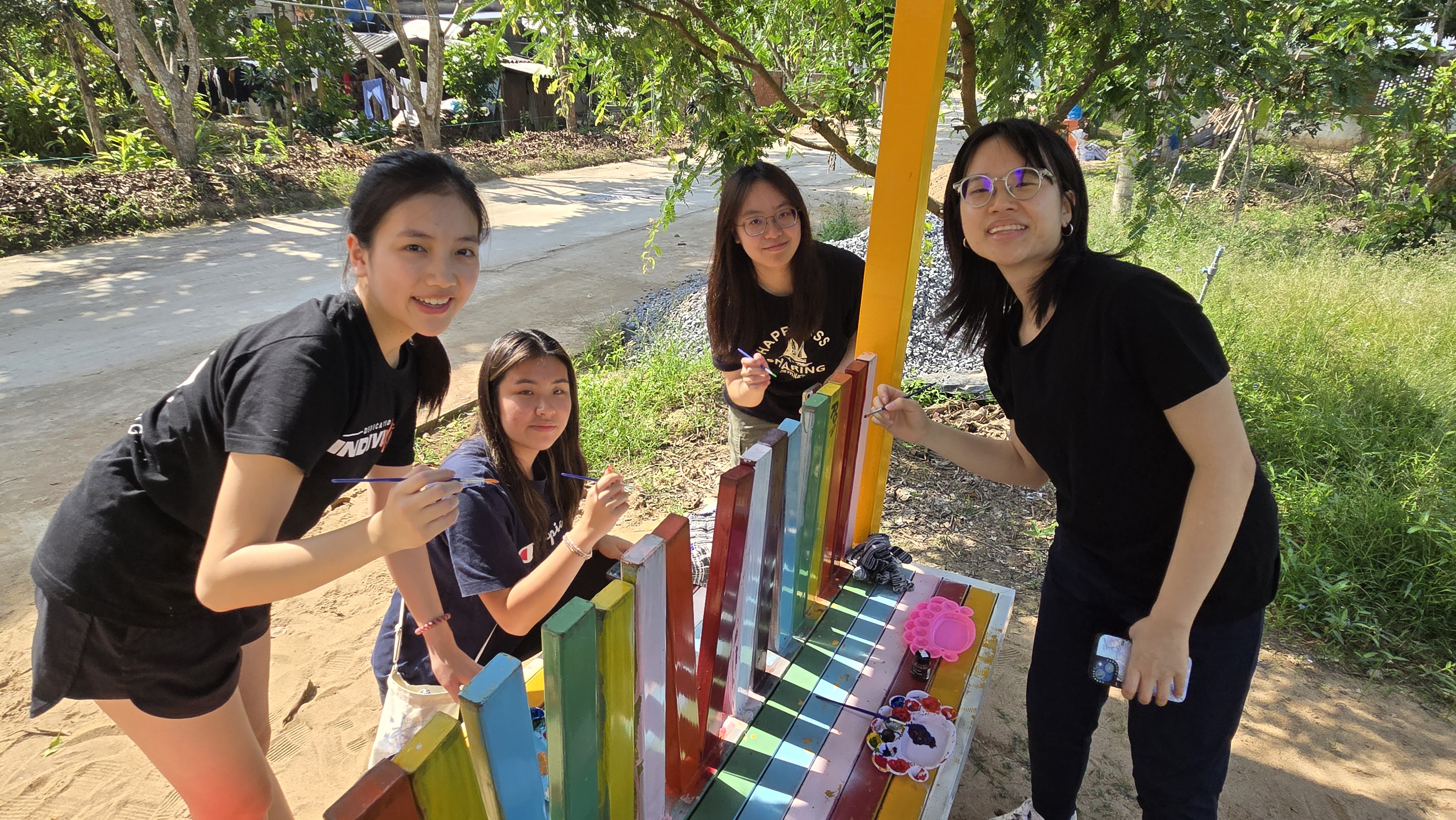 Volunteers refurbishing EVG Library, a new hang-out spot for local children and youth