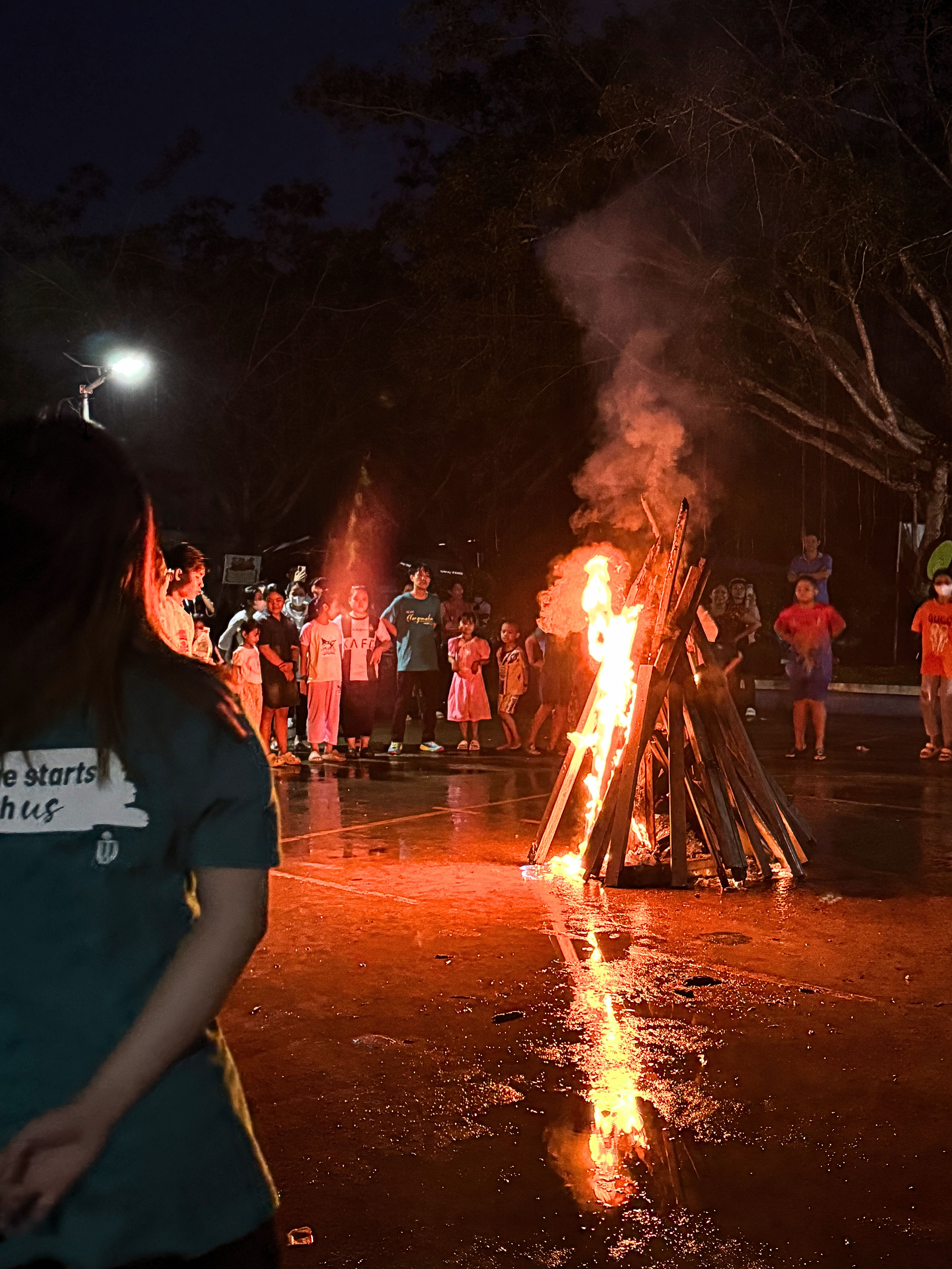 Having campfire with the local youth