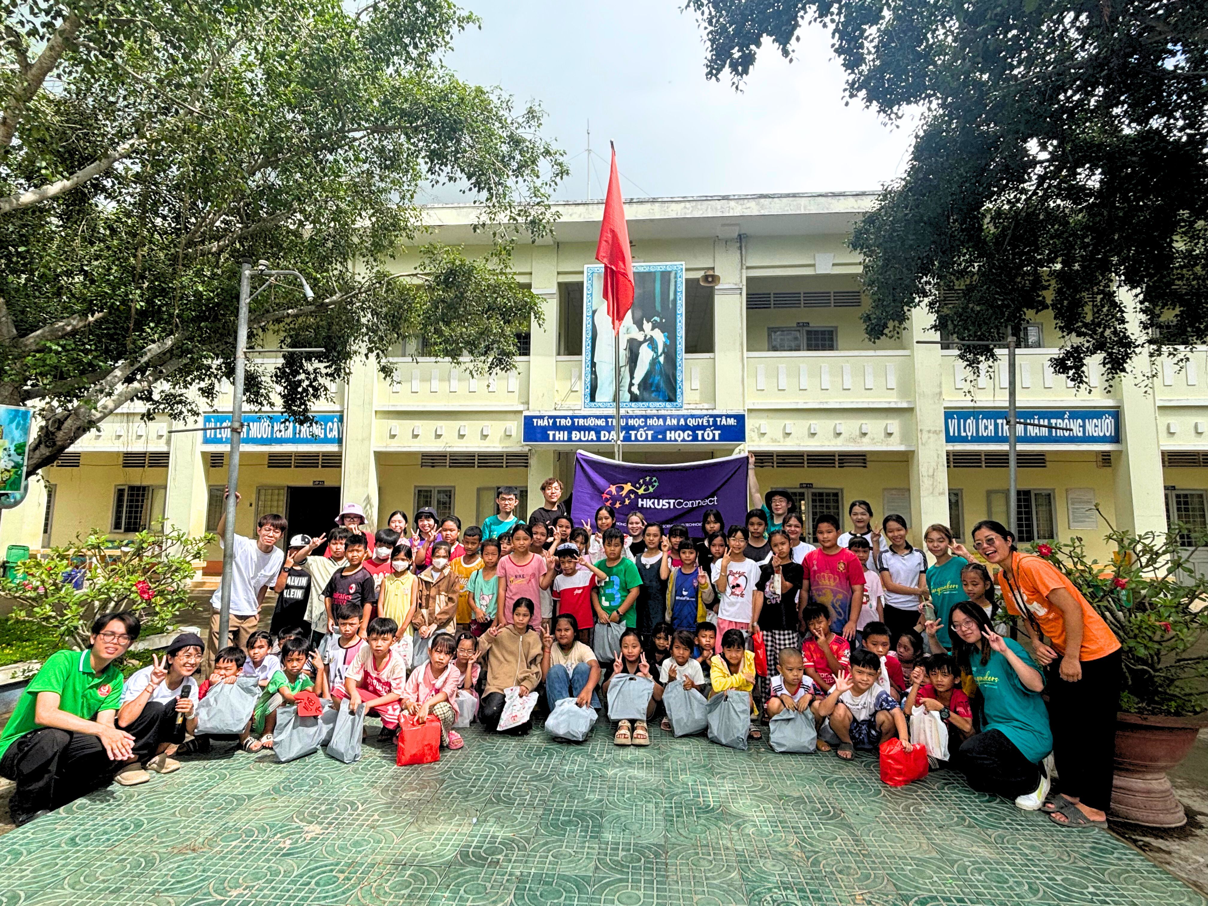Group photo taken at a local school on Carnival Day