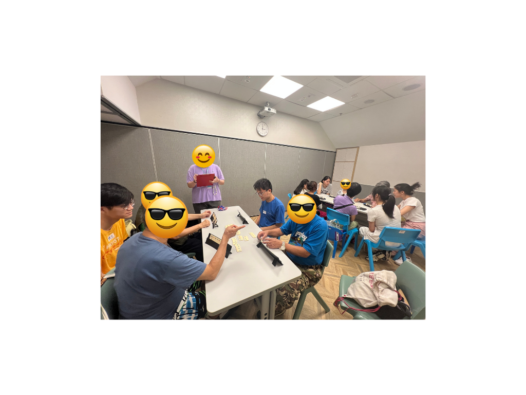 Students and elderly enjoying Rummikub together