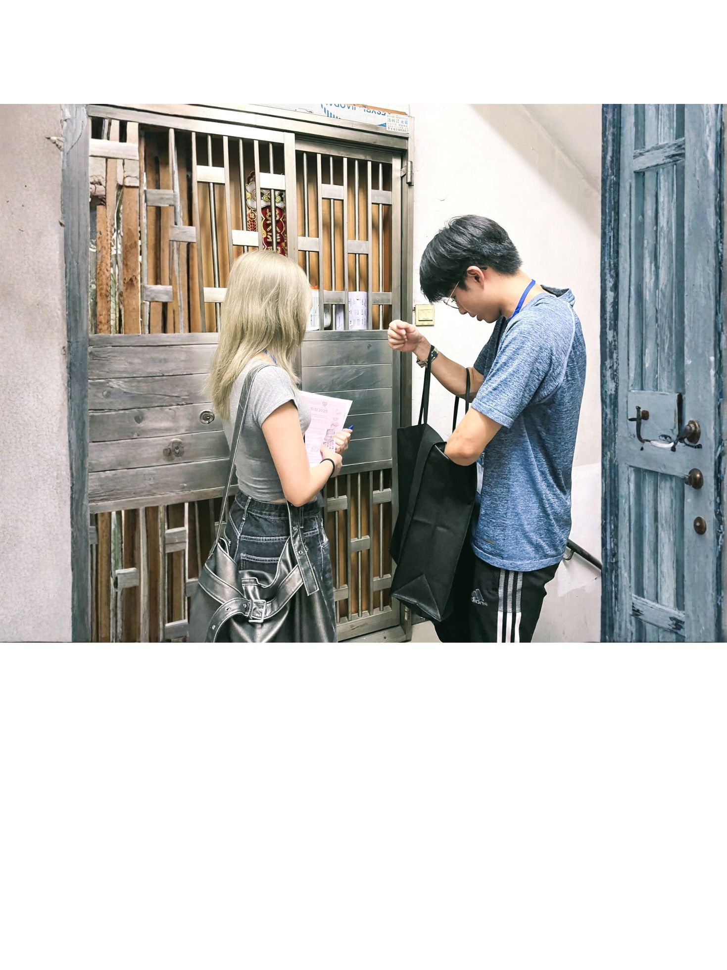 Volunteers visiting residents living in subdivided flats