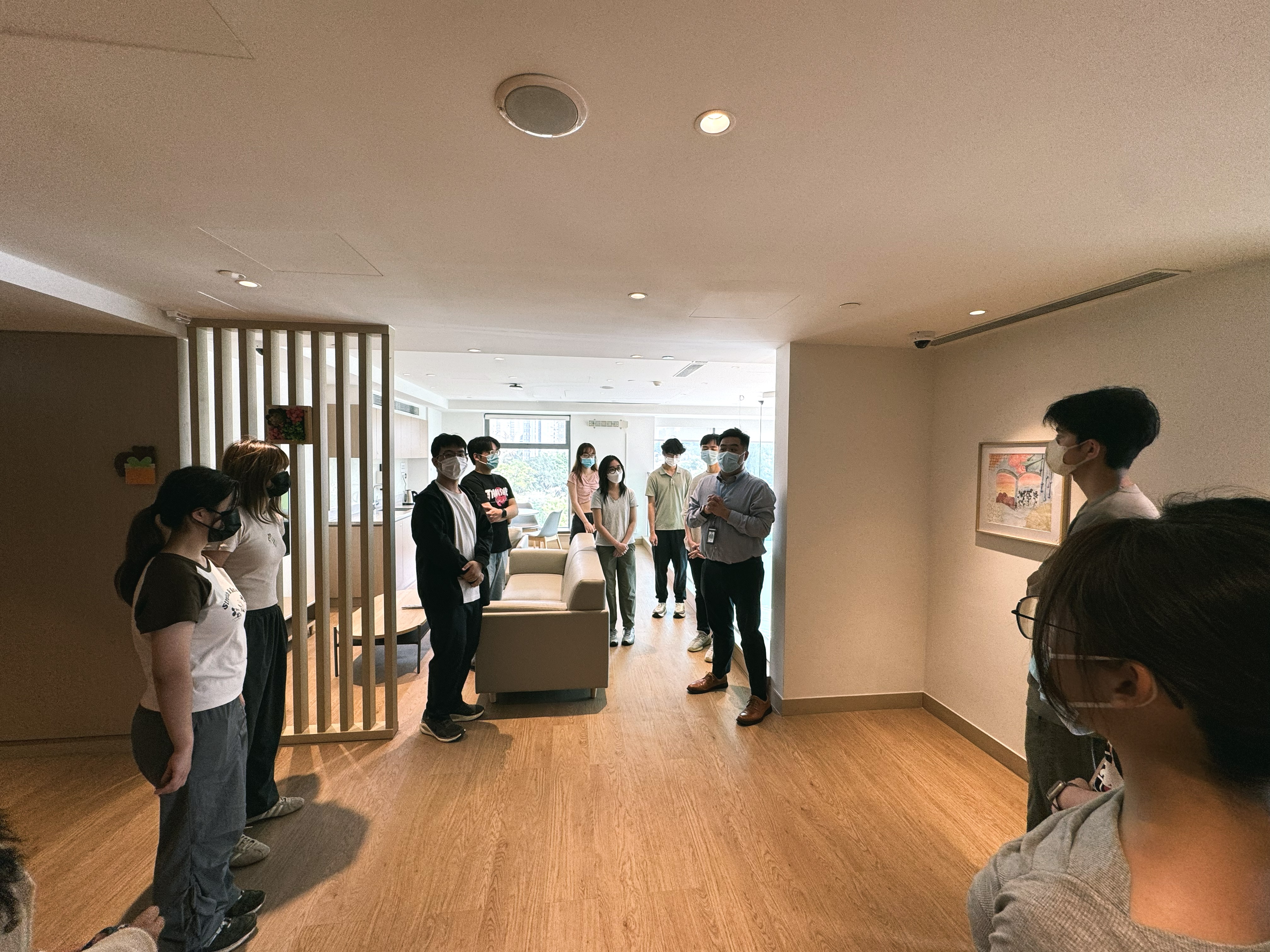 Volunteers learning about RMHC’s design and operation