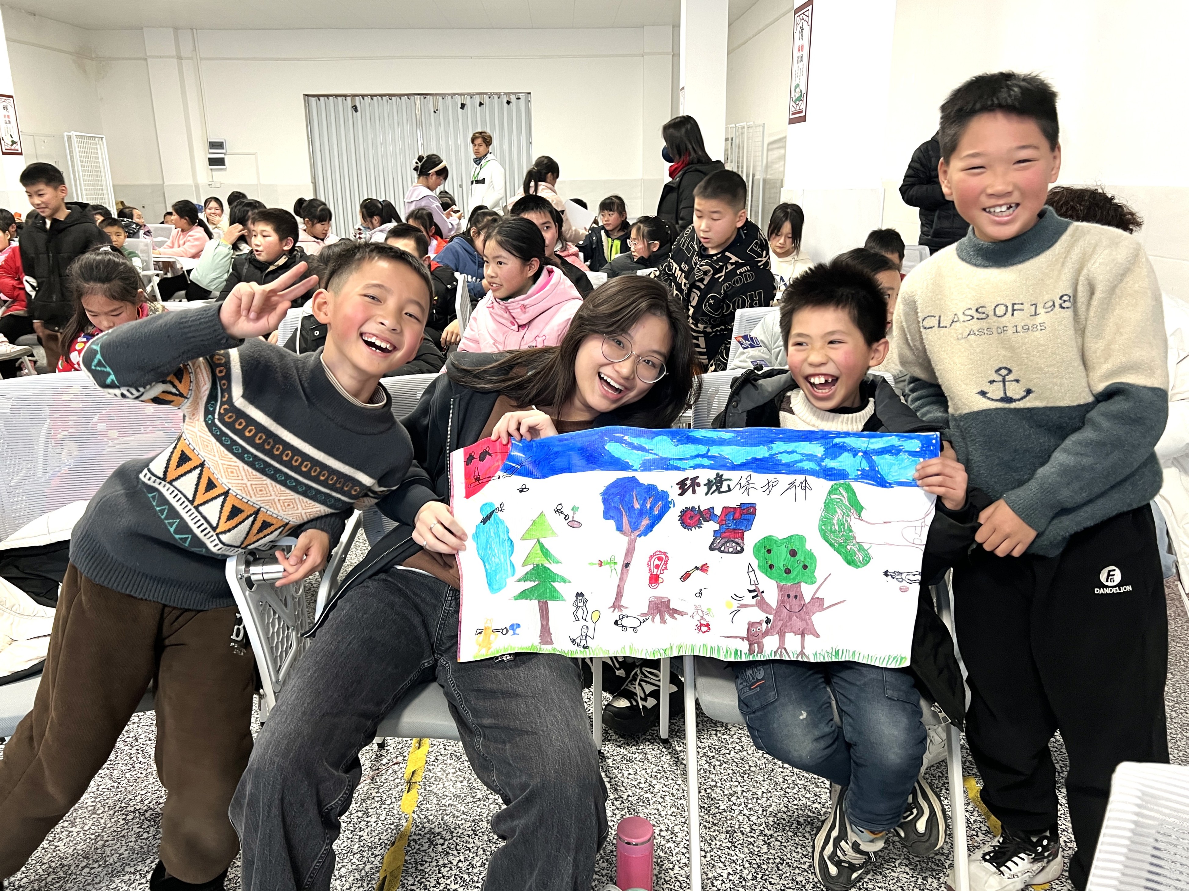 Children share their artwork promoting environmental protection.