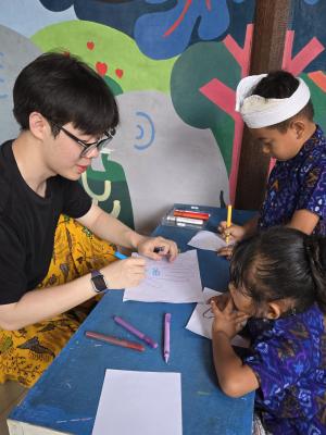 Teaching children arts & craft during Indonesia Service Learning Trip