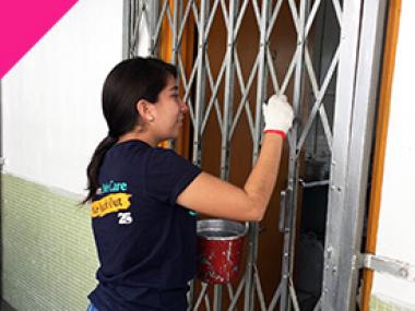 Serve 25 volunteer refurbishing metal gate for elderly.
