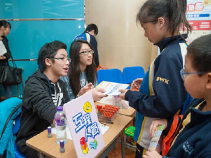 Volunteers holding activities at the game booths