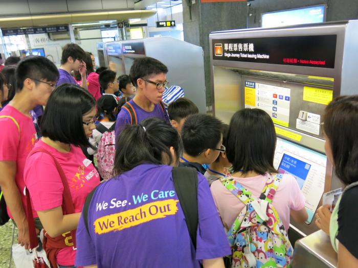 Children buying tickets for themselves