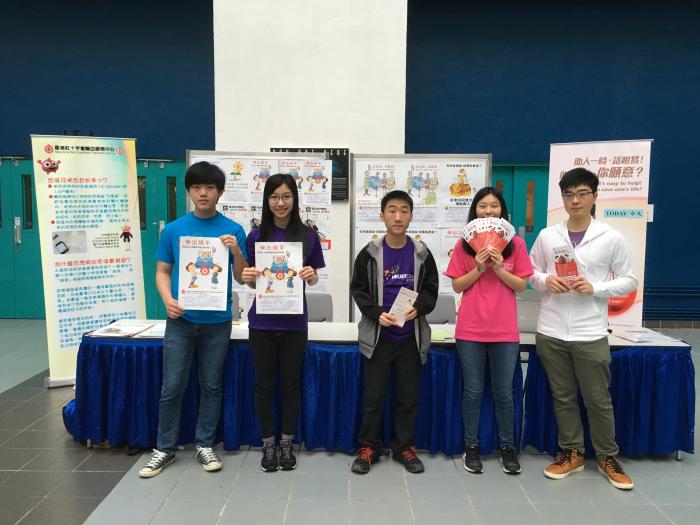 Volunteers promoting the event at the information booth