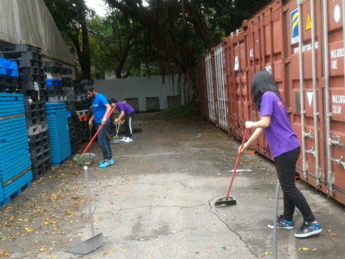 Volunteers helping in cleaning the Crossroads base