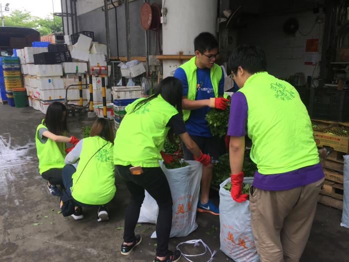 Volunteers packing the vegetables into bags so that they could be transported to those in need