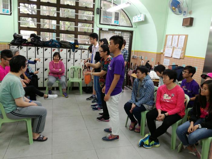 Volunteers playing interactive games with the service recipients