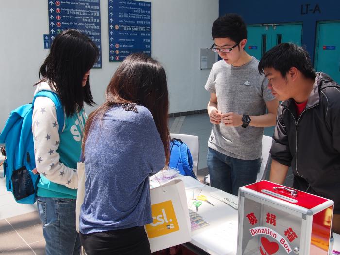 Students being informed about the service by the volunteers