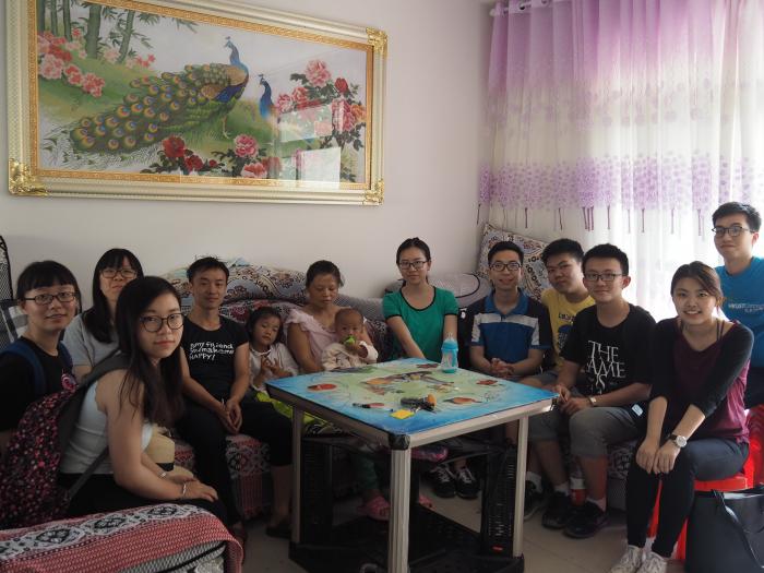 Volunteers visiting families relocated in the newly built community