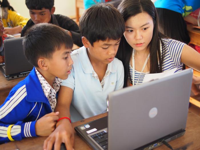Children learning basic computer skills
