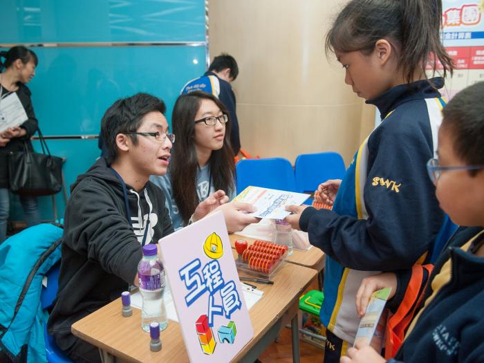 Volunteers conducting job interviews with students