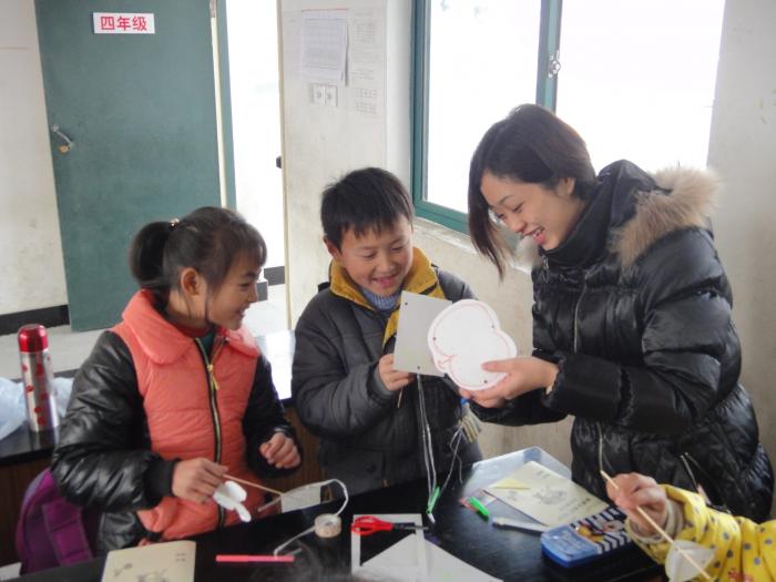 Both children and volunteers having fun