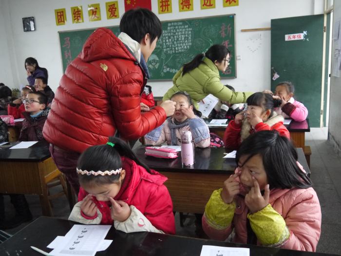 Children relaxing their eyes