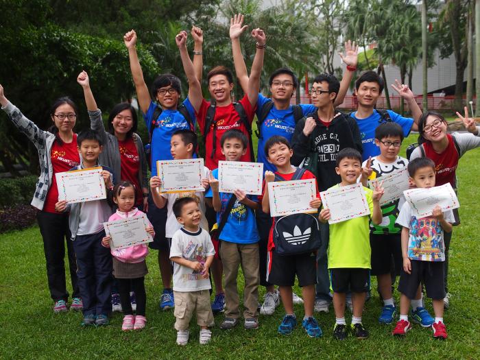 A group of photo of volunteers and the children