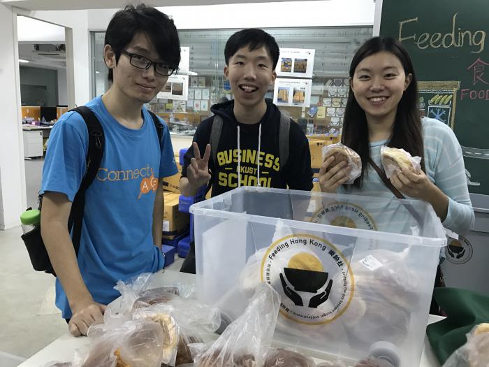 Volunteers helped sort bread with satisfied smiles!