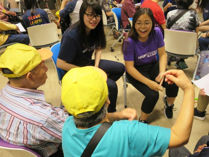 Volunteers and elderly discussing their views of life and death