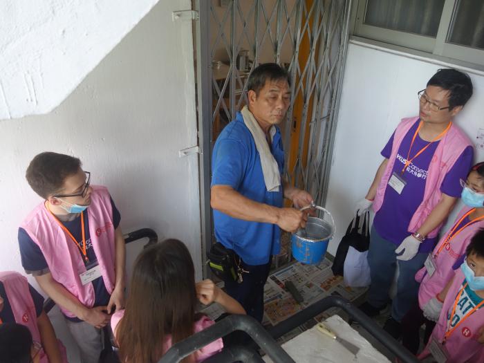 Volunteers are learning how to maintain metal gates.