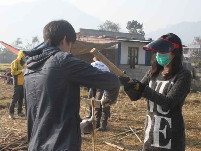 Cleaning up the bamboo for weaving