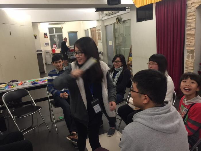 Volunteers playing interactive game with the kids