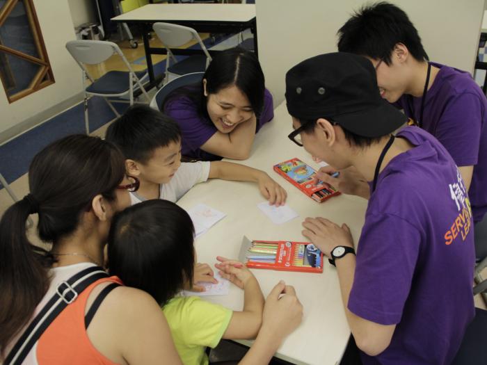 Children making a little booklet as a post-reading activity