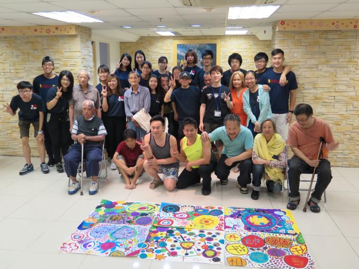 Finishing a circle painting with the homeless in Sham Shui Po
