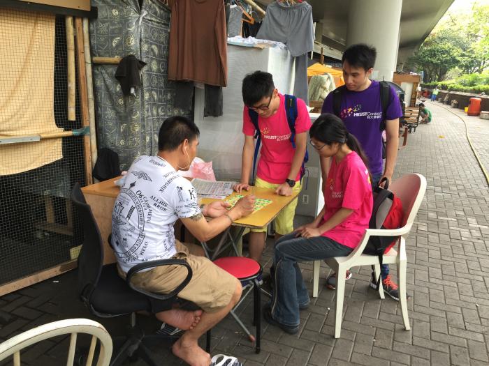 Chess playing with street sleepers in Sham Shui Po