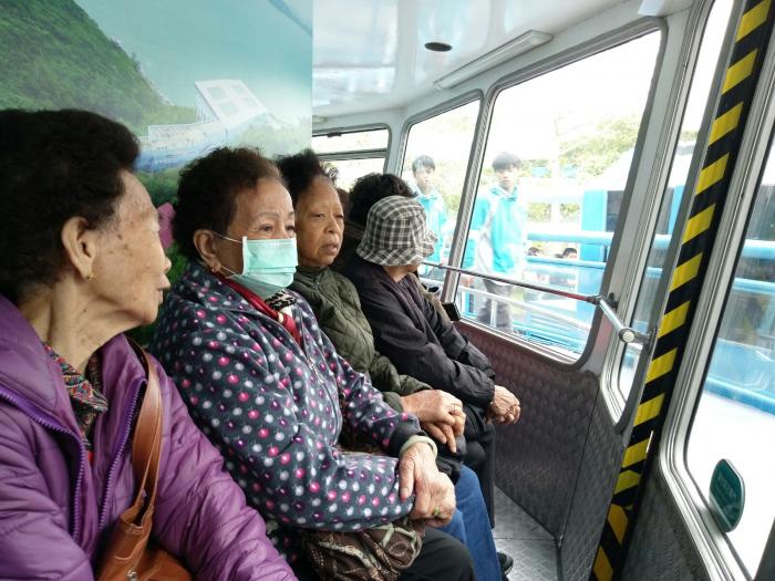 The elderly getting ready to see Hong Kong Island from above