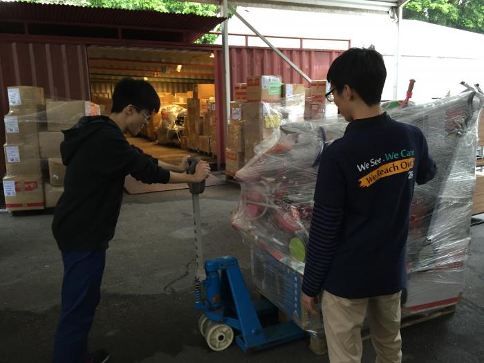 Relocating the donated bicycles to the warehouse.