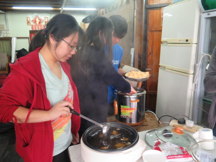 Preparing Chinese sweet soup for delivery to the elderly residents