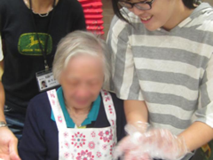 Volunteers and the elders enjoying the activities.