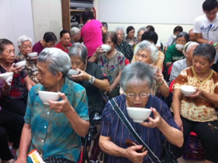 The elders enjoying the soup