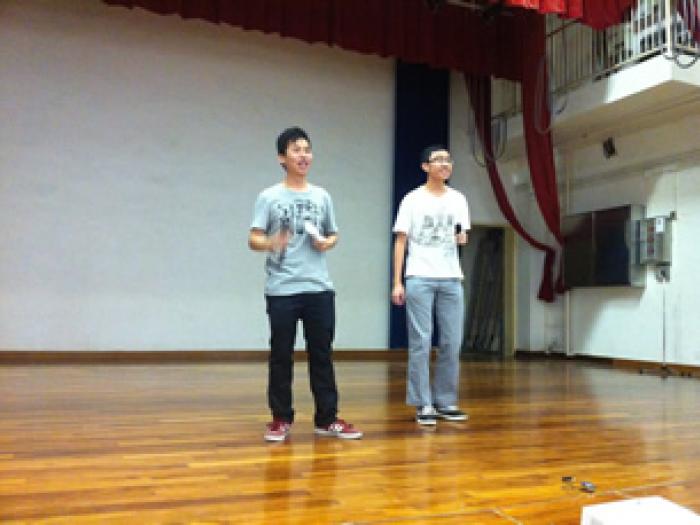 Student volunteers leading games for the elders