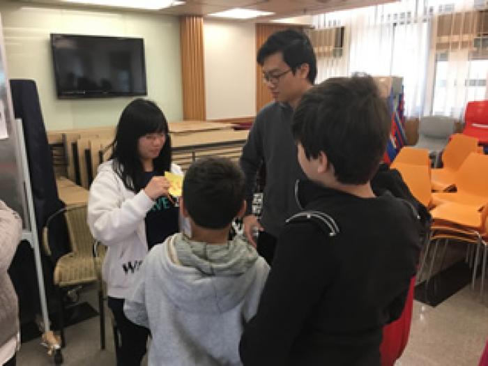 Children playing the game to gain ingredients for making yogurt cup!