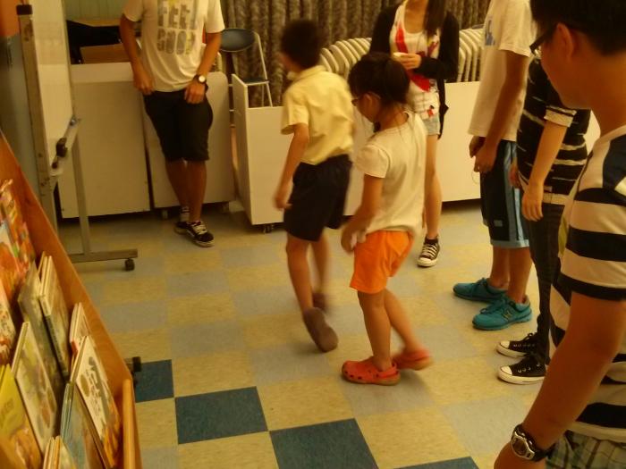 Volunteers  playing their designed games with the children