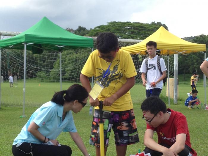 Volunteers ensuring the safety of the water rocket
