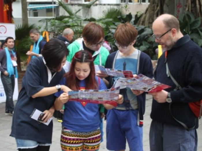 Teams planning their strategies to tackle the challenge