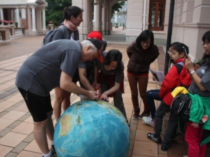 A team trying its best to answer the questions at a check-point