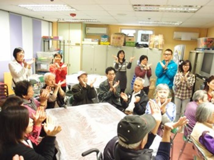 The elders practicing hand exercises