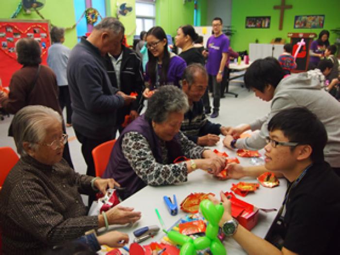 The elders enjoying handicrafts and other game booths prepared by our students