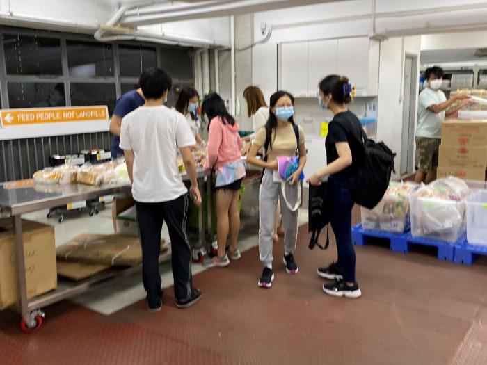 Volunteers are counting how much bread they have collected!