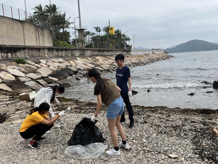 Collecting trash with groupmate