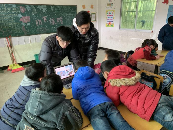 Volunteers teaching in an interactive way